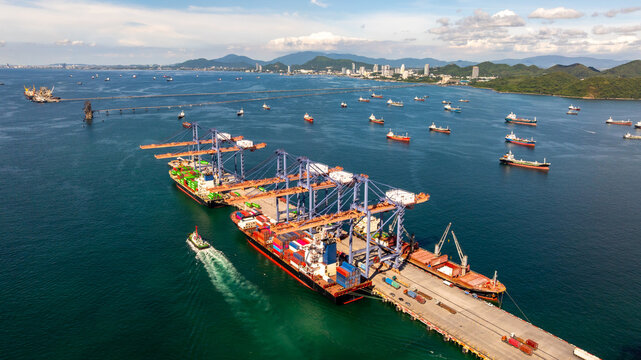 Aerial view container cargo ship international port terminal with gantry crane, Global business import export logistic maritime transport by container cargo ship vessel, Container ship cargo freight.