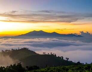 Sunrise over misty mountains