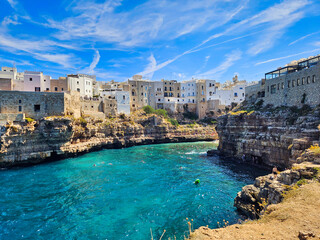 Old brick building on the edge of the cliff. Polignano a mare. Polignano di mare. Traditional...