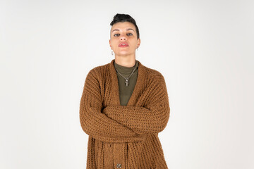 Young person posing with a determined and powerful expression