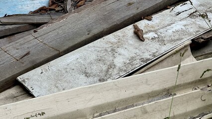 a close-up, detailed view of a chaotic pile of discarded materials