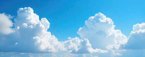 Vast expanse of fluffy cumulus clouds against a brilliant blue sky, perfect for serene backgrounds and peaceful imagery Ideal for travel, nature, and weather-related projects , serene, majestic