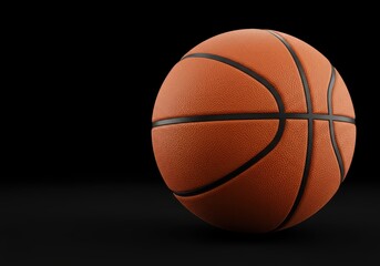 A close-up view of an orange basketball with dark stitching, set against a deep black backdrop.