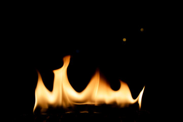Bright Flames Dancing in Darkness Creating Warm and Energetic Vibe