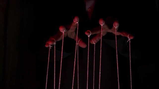 The puppeteer controls the puppets in the theater. Managing people at work, in politics and government. Action control.