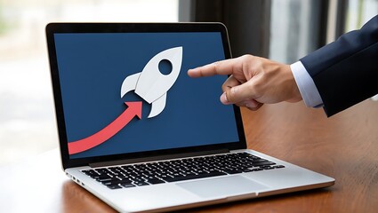 Laptop with rocket launch illustration and upward arrow for business growth