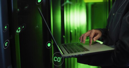 IT technician typing on laptop in data center, with server racks, green LEDs, icons, copy space