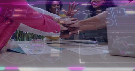 Professional team of five placing hands together in office meeting room, with data overlays