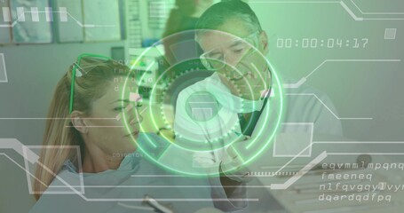 Reviewing tablet, doctor advising patient wearing goggles in dental clinic with holographic data
