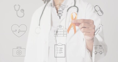 Doctor in white lab coat holding orange awareness ribbon in studio, with floating medical icons