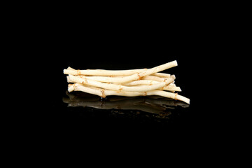 Fresh White Bamboo Shoots on Black Background - Asian Vegetable Root Display