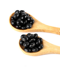 Black Soybeans and Sesame Seeds in Wooden Spoons - Healthy Grain Ingredients on White Background