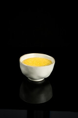Shanxi Yellow Millet in White Bowl - Nutritious Rare Grain for Gourmet Breakfast