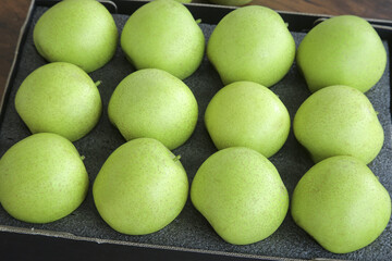 Fresh Green Pears in Dark Gift Box - Organic Fruit Arrangement for Market Display