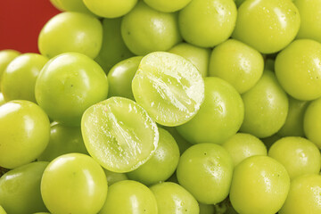 Fresh Green Grapes Cut in Half Showing Juicy Interior - Healthy Organic Fruit