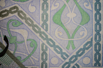 Macro Shot of One Riyal Inscription on Banknote