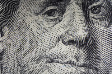 Macro Shot of Franklin's Eyes on 100 Dollar Bill