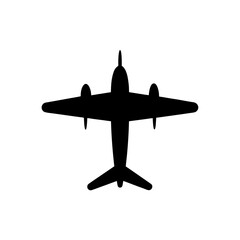 A lone tree stands against a vibrant sunset silhouette