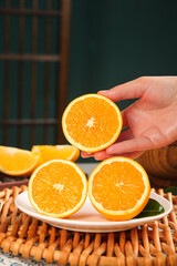 Fresh Orange Slices in Hand - Sweet Citrus Fruit Summer Healthy Snack