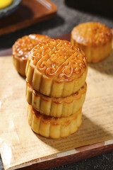 Traditional Cantonese Mooncakes with Lotus Paste and Egg Yolk for Mid-Autumn Festival Holiday...