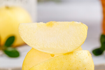 Fresh Golden Apple Slices Stacked Together on Kitchen Counter - Healthy Fruit Snack