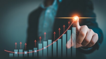 Person touching digital graph visualizing business growth and success with upward trending financial data and rising stock market charts