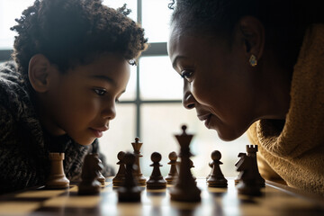 AI. Mother and son playing chess