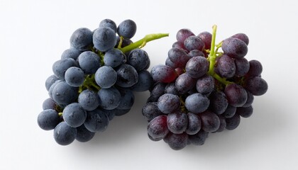 Fototapeta premium Overhead three quarter angle capture of two clusters of fresh grapes, showcasing vibrant colors and textures, ideal for food photography and healthy lifestyle concepts