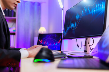 Digital trader studying real-time candlestick charts.