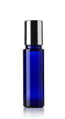 Cobalt blue glass essential oil roller bottle with a silver cap, an isolated product shot, on a white background with copy space