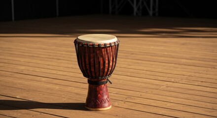 Wooden drum on a wooden stage floor