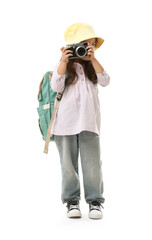 Choice of profession. Little girl with camera pretending to be photographer on white background