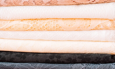 Close up of lace textures in layers, pastel colors. High quality photo