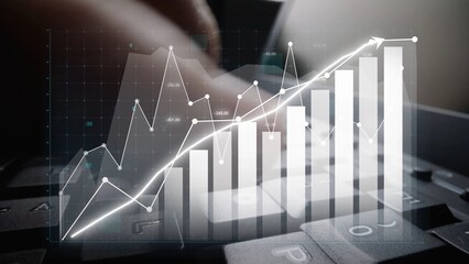 Visual representation of financial growth featuring a chart overlayed on a keyboard, symbolizing data analytics, business strategy, and economic development. Copula