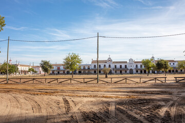 El Rocio, Sevilla, Andalusia, Spain. 28 August 2025. Traditional houses and sandy square in El Rocio