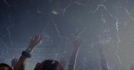 Starting with front crowd lifting arms to beat, hands rising and falling celebrating party vibe