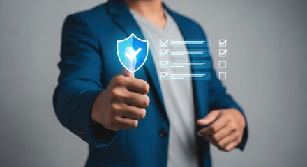 Businessman holding a shield with a checkmark, representing security and quality assurance