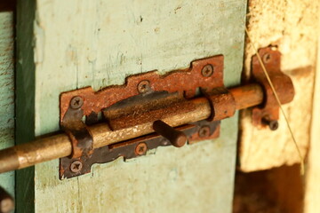 Close-up view of a door latch and surrounding area