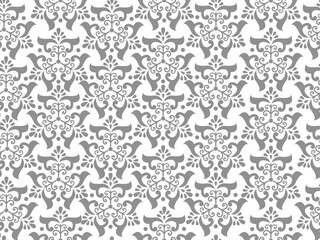 Elegant gray and white damask pattern featuring intricate floral and ornamental designs, perfect for wallpaper, fabric, and decorative projects. 