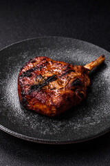 Steak, beef or pork on the bone, meat cooked on the grill with rosemary. Steak on the bone