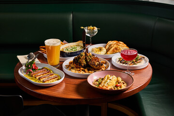 Elegant Dining Setup: Grilled Cauliflower, Cod and Drinks.