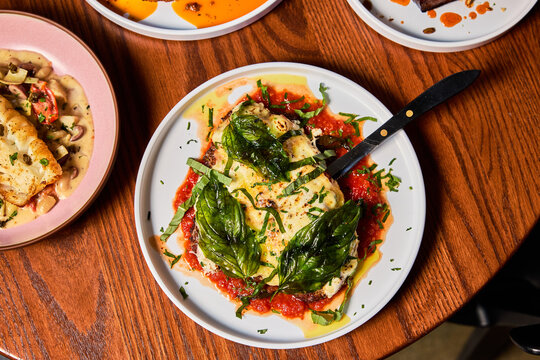 Artisanal Italian Dish with Fresh Basil and Tomato Sauce