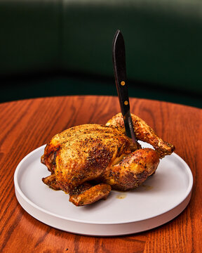 Golden Roast Chicken Moments Before Carving