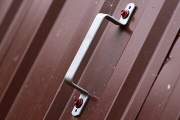 Close-up shot of a metal door handle