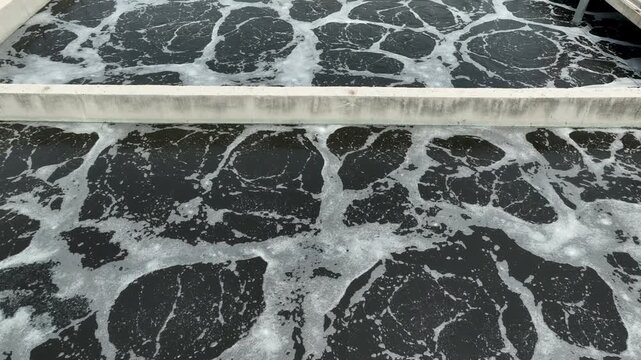 Close Up Aerial View of Foamy Aeration Tank in Industrial Effluent Treatment Plant