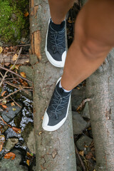 Woman legs with barefoot hiking shoes in the  mountain