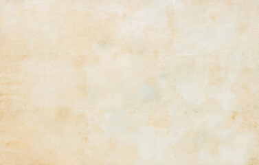 Old beige paper texture with soft stains and subtle grunge effect for backgrounds or design projects