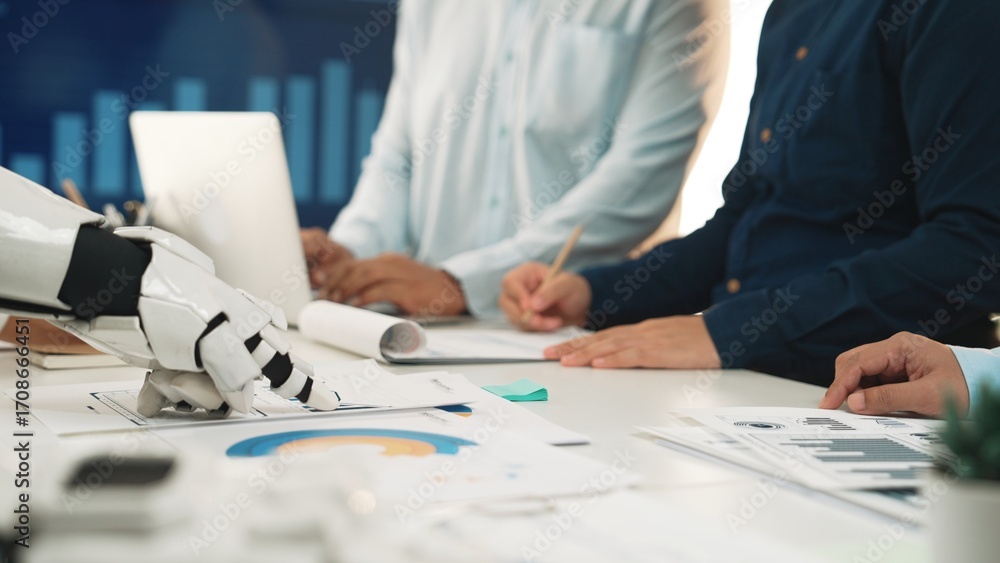 Poster a human team collaborates with a robot in a modern office, analyzing financial charts and discussing