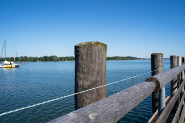 Wooden pier in the lake in summer 