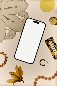 Flat lay of smartphone with personal daily stuff